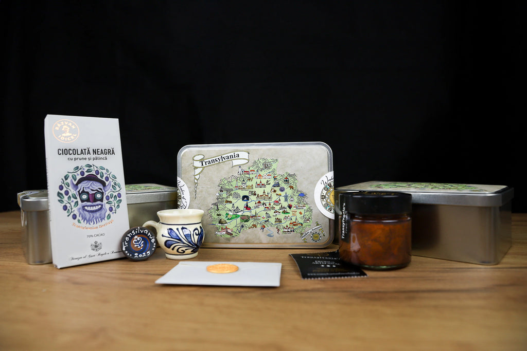 Collection of chocolate packaging and related items on a wooden surface with a dark background